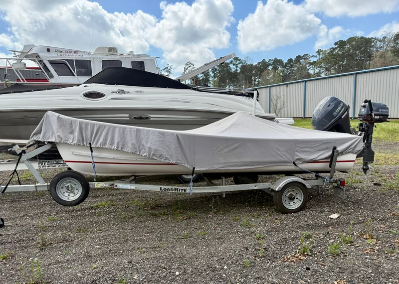 The Image of Covered Holland 14 boat on trailer, 2020 model. - 0