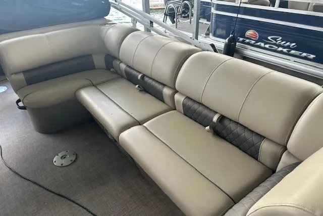 Slide: The Image of Luxurious seating on 2022 Sun Tracker Fishin' Barge 24 DLX pontoon boat. - 12