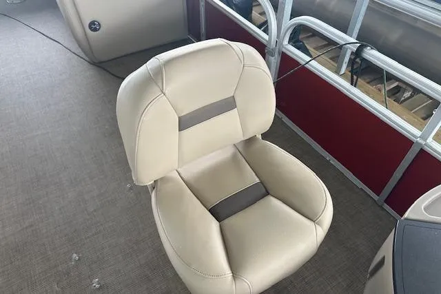Slide: The Image of Beige seat on 2022 Sun Tracker Fishin' Barge 24 DLX pontoon boat interior. - 8