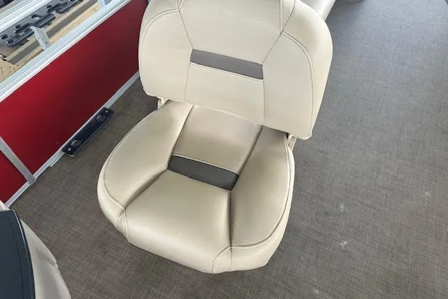 Slide: The Image of Beige seat on 2022 Sun Tracker Fishin' Barge 24 DLX boat interior. - 9