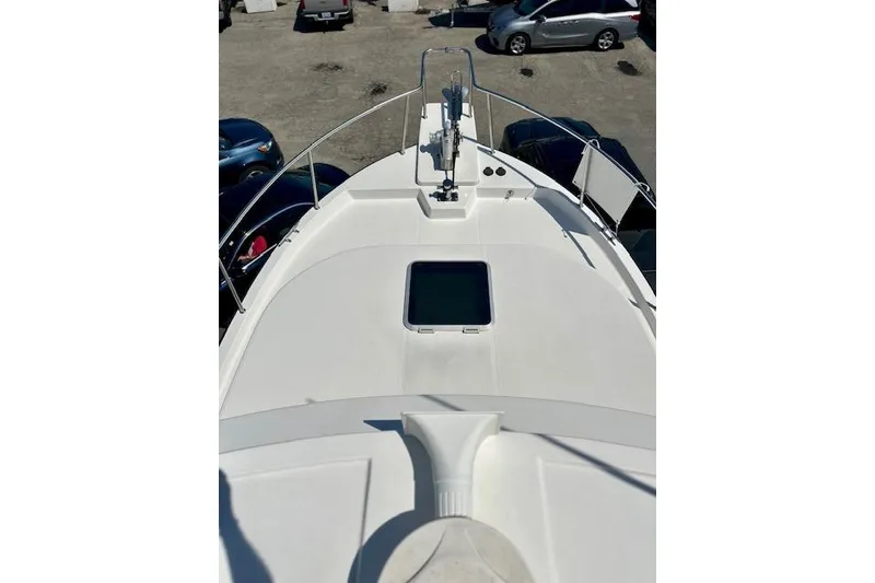 Slide: The Image of Nordic Tug 37 (2006) boat deck view with railing and hatch. - 3