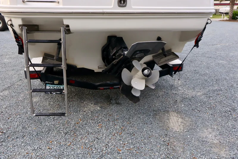 Slide: The Image of 2011 Sea Ray Sundancer 280 boat interior with seating and sink area. - 23