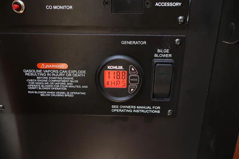 Slide: The Image of Control panel of a 2011 Sea Ray Sundancer 280 with Kohler generator display. - 41