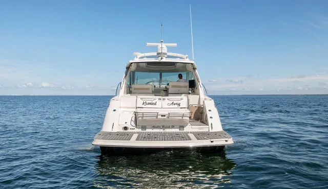 Slide: The Image of Control panel of a 2011 Sea Ray Sundancer 280 boat with switches and gauges. - 6