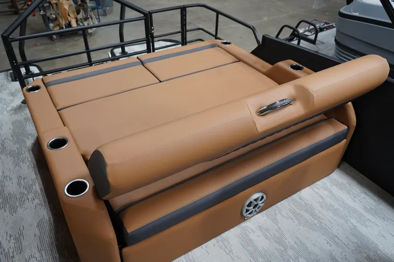 Slide: The Image of 2026 Sylvan L3 ULZ boat interior with tan seating and cup holders. - 5