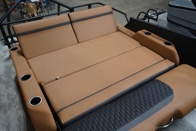 Slide: The Image of Luxurious tan seating on 2026 Sylvan L3 ULZ boat with cup holders and sleek design. - 9