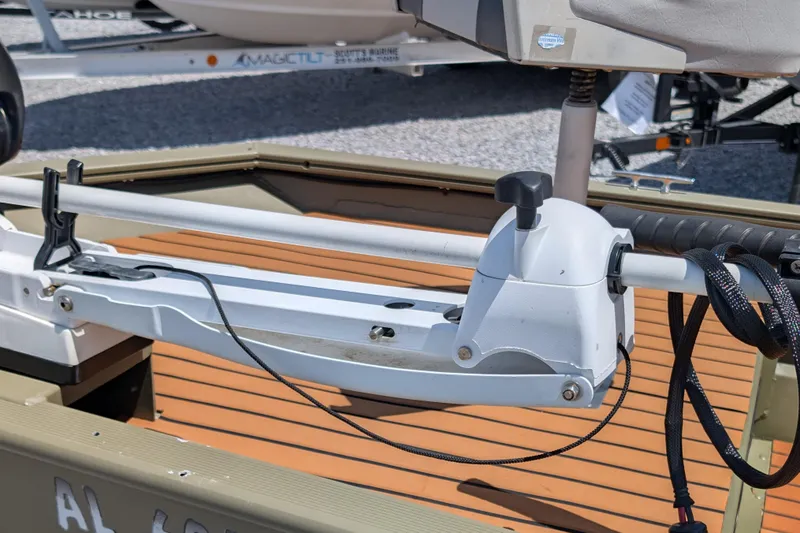 Slide: The Image of 2014 Bass Tracker boat with mounted trolling motor on deck. - 5