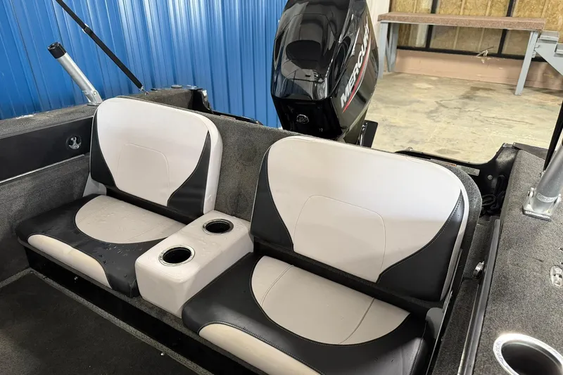 Slide: The Image of 2015 Starweld 1600 DC Ski boat interior with dual seats and Mercury engine. - 7