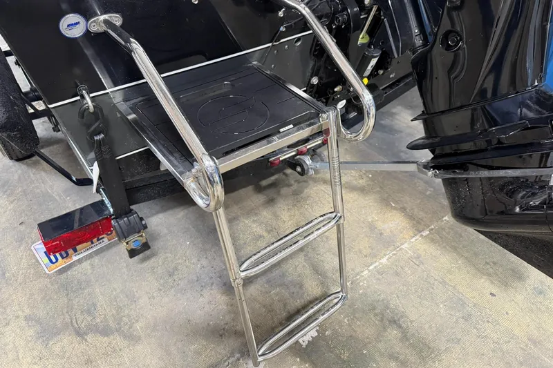 Slide: The Image of Stainless steel ladder on a 2015 Starweld 1600 DC Ski boat, rear view. - 9