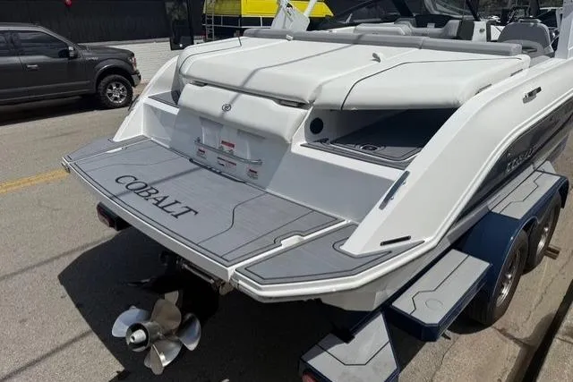 Slide: The Image of 2024 Cobalt CS22 boat on trailer, showcasing sleek design and powerful engine. - 25