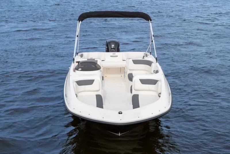 Slide: The Image of 2026 Bayliner Element E18 boat on open water, featuring spacious seating and sleek design. - 4