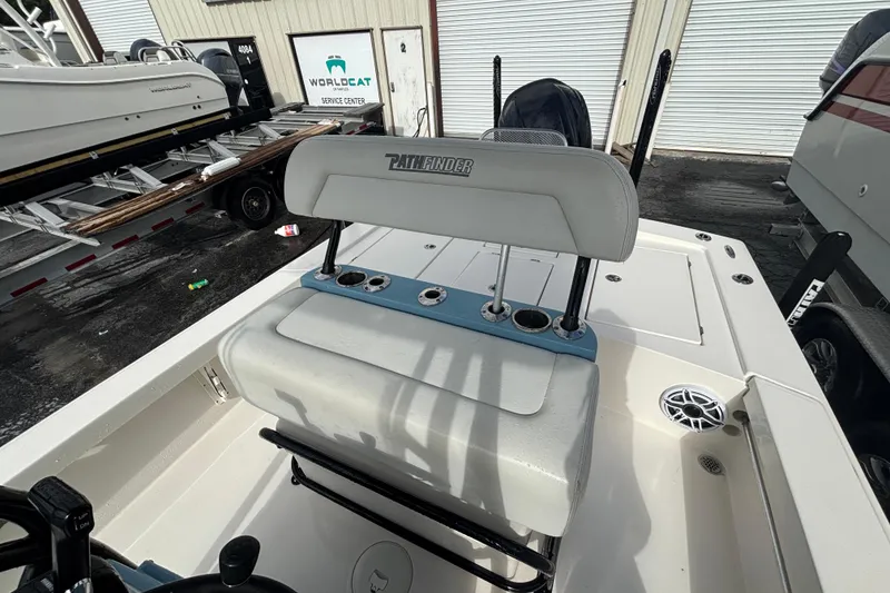 Slide: The Image of 2023 Pathfinder 2300 HPS boat interior with seating and cup holders. - 17