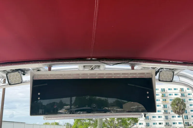 Slide: The Image of 1997 Wellcraft 302 Scarab Sport boat canopy with LED lights and control panel. - 13