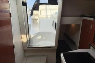 Slide: The Image of Compact bathroom in 2004 Sea Ray Sundancer 260 boat with sink and toilet. - 20