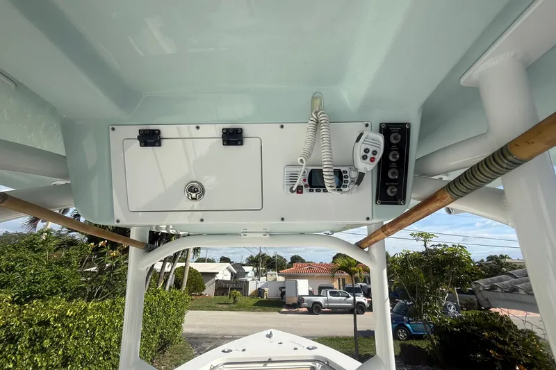 Slide: The Image of 2023 Sea Pro 219 Deep V CC boat console with radio and control panel. - 6