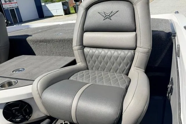 Slide: The Image of 2022 Vexus VX21 boat seat with diamond-stitched gray leather upholstery. - 12
