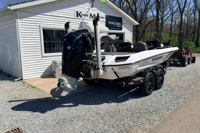 Slide: The Image of 2022 Vexus VX21 boat parked outside Knox Marine dealership. - 3