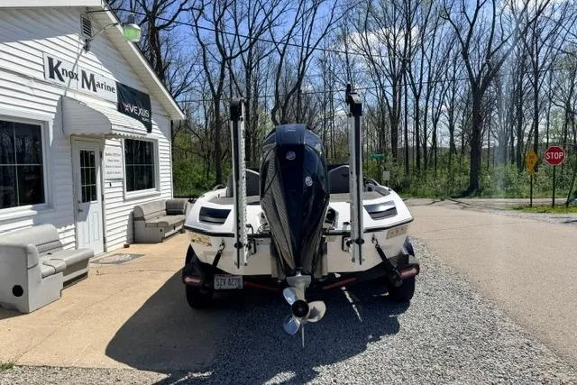 Slide: The Image of 2022 Vexus VX21 boat parked outside Knox Marine dealership. - 5