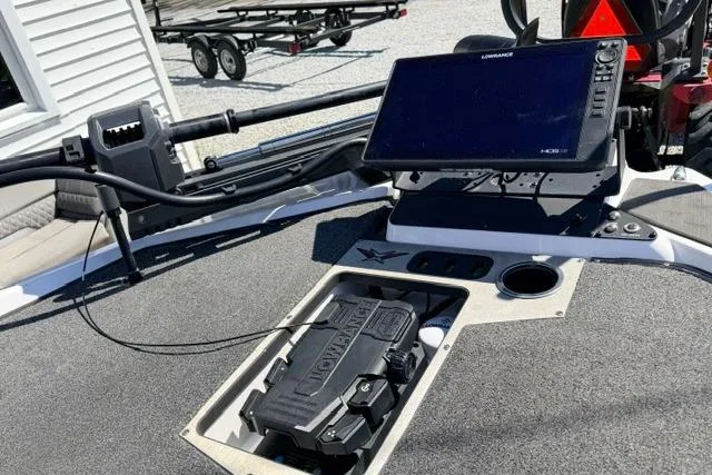 Slide: The Image of 2022 Vexus VX21 boat dashboard with Lowrance electronics and control panel. - 9