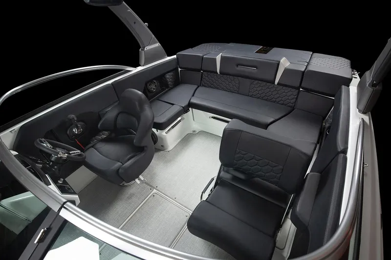 Slide: The Image of Manufacturer Provided Image: 2025 Four Winns H2 OB boat interior with sleek black seating and modern design. - 14