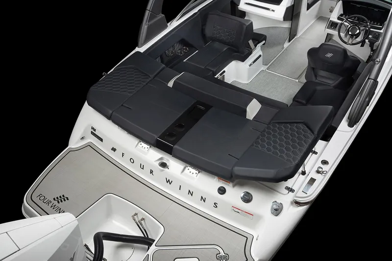 Slide: The Image of Manufacturer Provided Image: 2025 Four Winns H2 OB boat interior with sleek seating and modern design. - 16