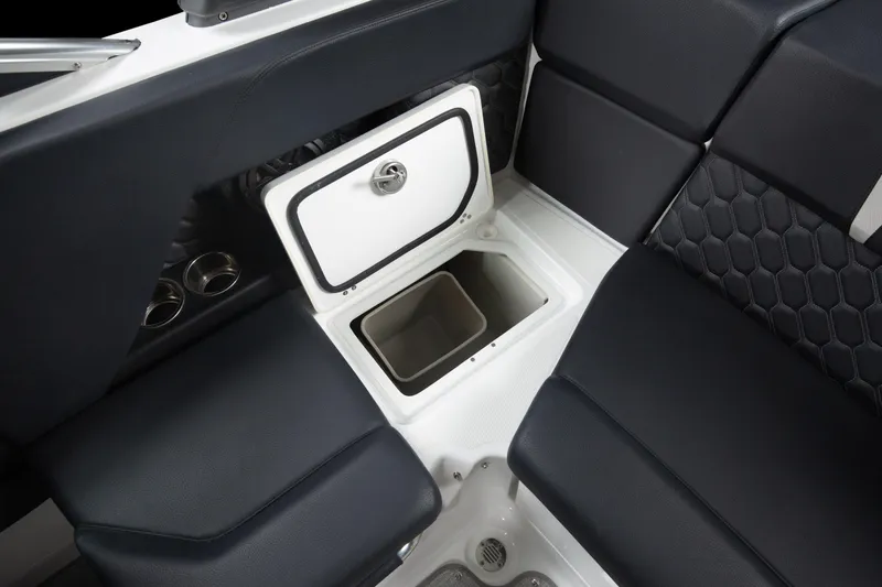 Slide: The Image of 2026 Four Winns H2 OB boat interior with storage compartment and cup holders. - 19