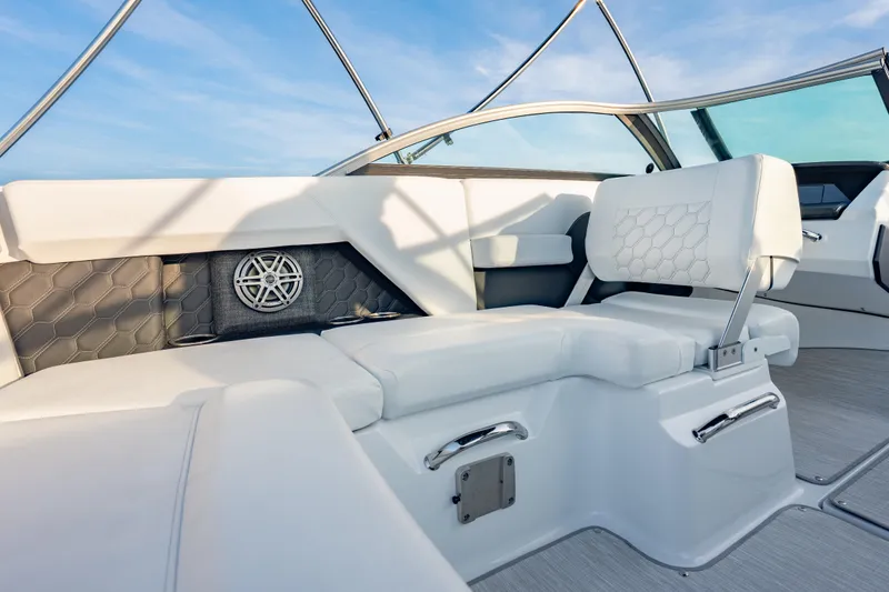 Slide: The Image of Luxurious interior of 2026 Four Winns H2 OB boat with elegant seating and modern design. - 29