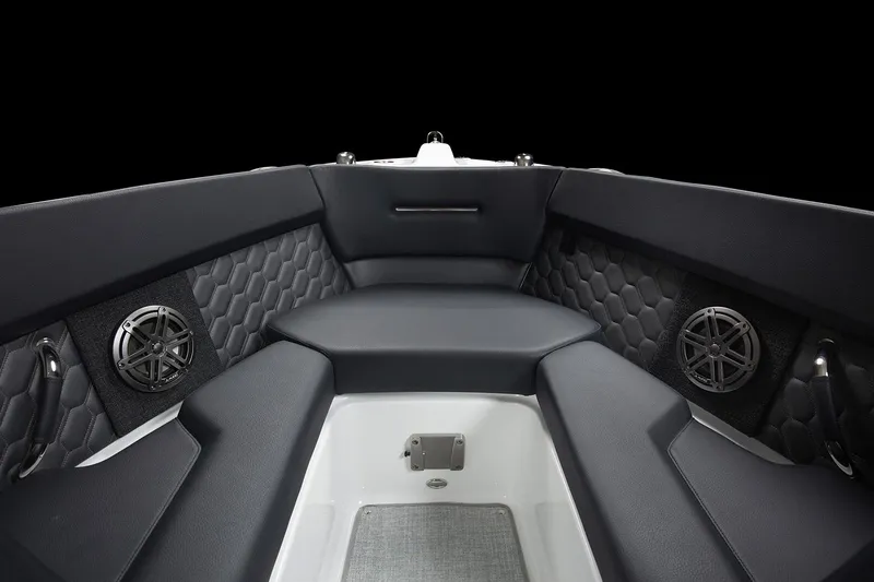 Slide: The Image of Manufacturer Provided Image: 2025 Four Winns H2 OB boat interior with sleek seating and modern speaker system. - 6