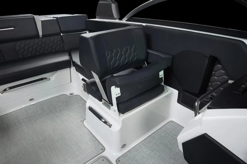 Slide: The Image of Manufacturer Provided Image: 2025 Four Winns H2 OB boat interior with modern seating and sleek design. - 7