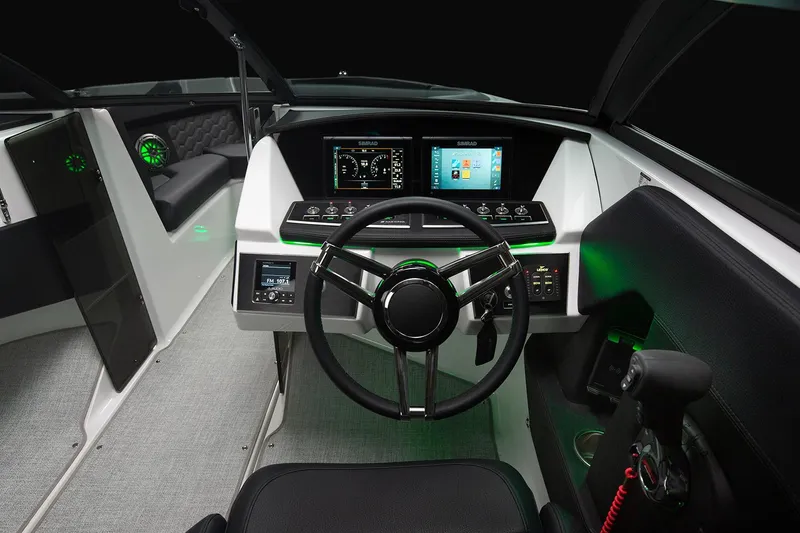 Slide: The Image of Manufacturer Provided Image: 2025 Four Winns H2 OB boat dashboard with modern controls and illuminated displays. - 8