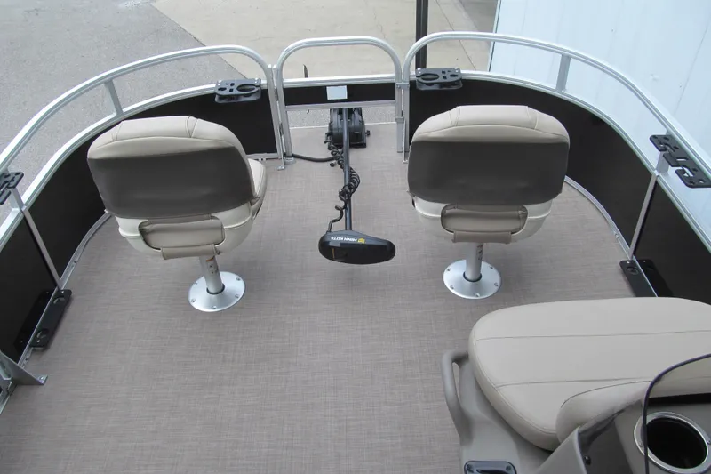 Slide: The Image of 2021 Sun Tracker Bass Buggy 16 XL pontoon boat interior with seating and controls. - 6