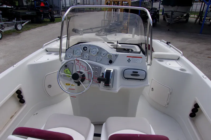 Slide: The Image of 2008 Tahoe 215 CC boat cockpit with steering wheel and instrument panel. - 6