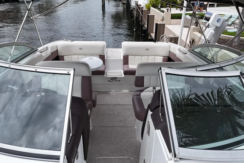 Slide: The Image of 2013 Cobalt 296 boat interior with seating and water view. - 17
