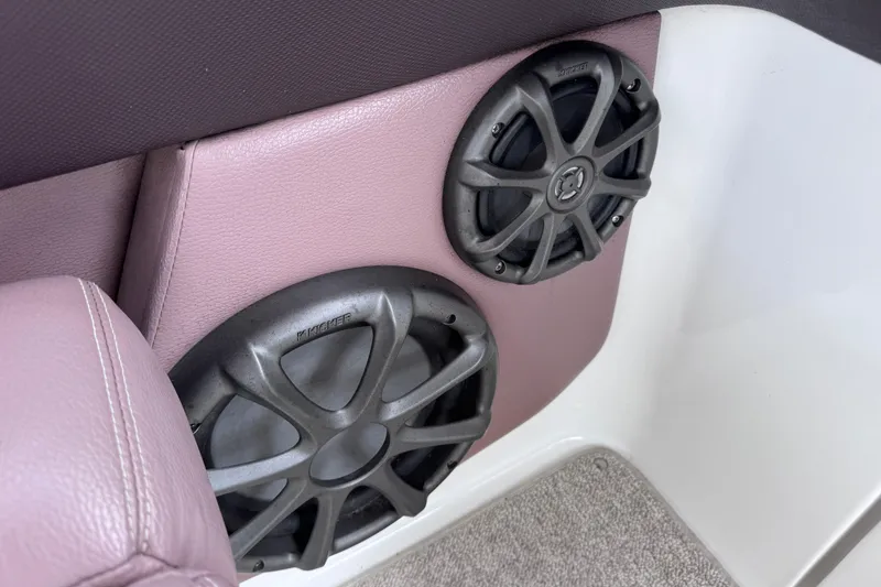 Slide: The Image of Speakers installed in a 2013 Cobalt 296 boat with purple upholstery. - 41