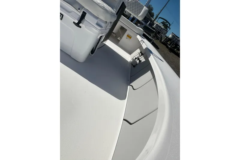 Slide: The Image of 2026 Delta Boatworks Delta D18 interior view, showcasing seating and storage compartments. - 10