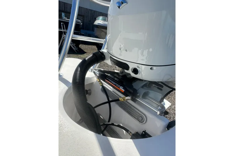 Slide: The Image of 2026 Delta Boatworks Delta D18 engine detail with hydraulic components and tubing. - 15