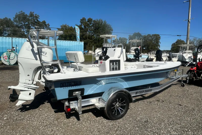 Slide: The Image of 2026 Delta Boatworks Delta D18 on trailer, featuring Suzuki outboard motor. - 2