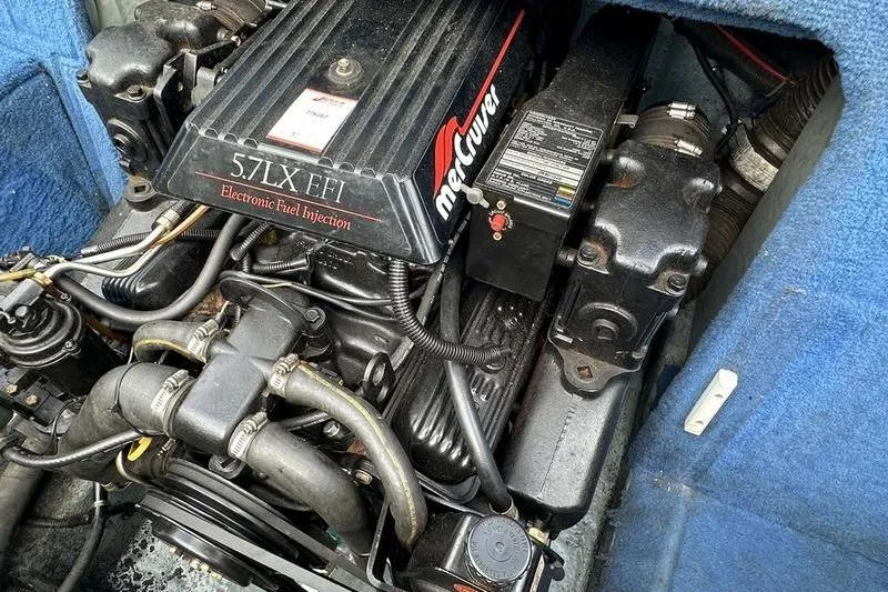 Slide: The Image of Engine of 1994 Sea Ray 220 Overnighter Signature with 5.7LX EFI electronic fuel injection. - 24