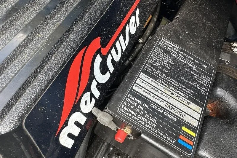 Slide: The Image of MerCruiser engine detail on 1994 Sea Ray 220 Overnighter Signature boat. - 27