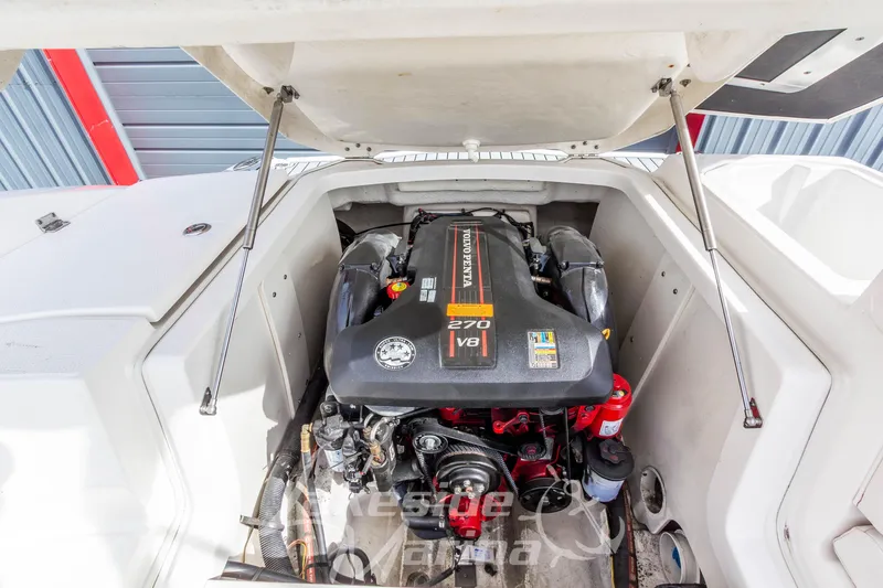 Slide: The Image of 2012 Chaparral 226 SSi boat engine compartment with Volvo Penta 270 V8 engine. - 20