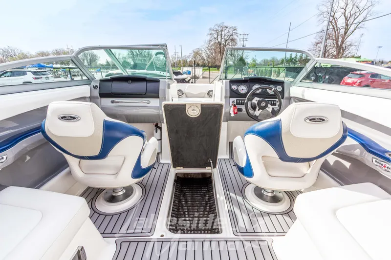 Slide: The Image of Interior of 2012 Chaparral 226 SSi boat with blue and white seating. - 22
