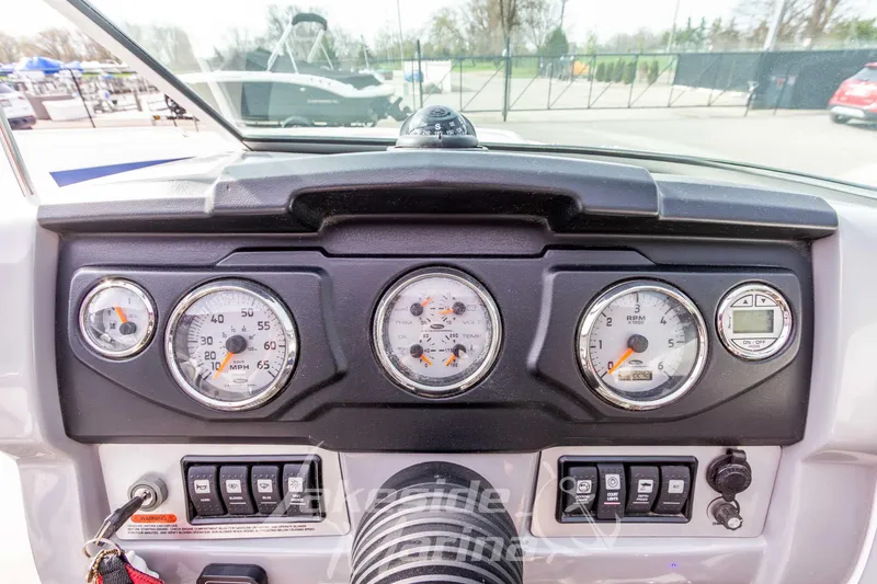 Slide: The Image of Dashboard of 2012 Chaparral 226 SSi boat with gauges and controls. - 26