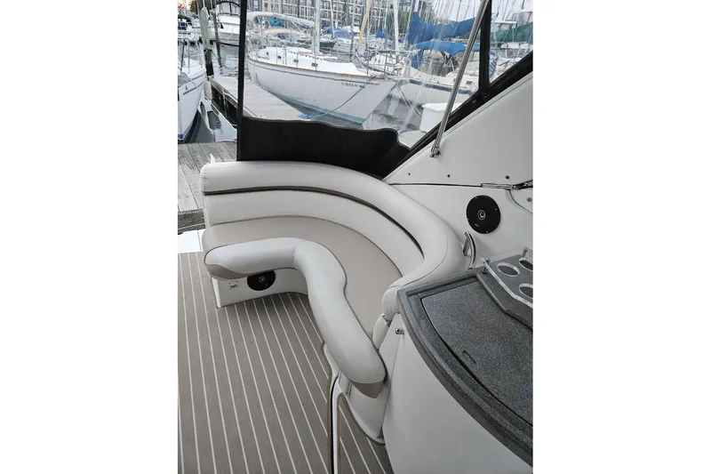 Slide: The Image of Interior of a 1999 Doral 360 SE yacht with elegant seating and compact kitchen. - 4