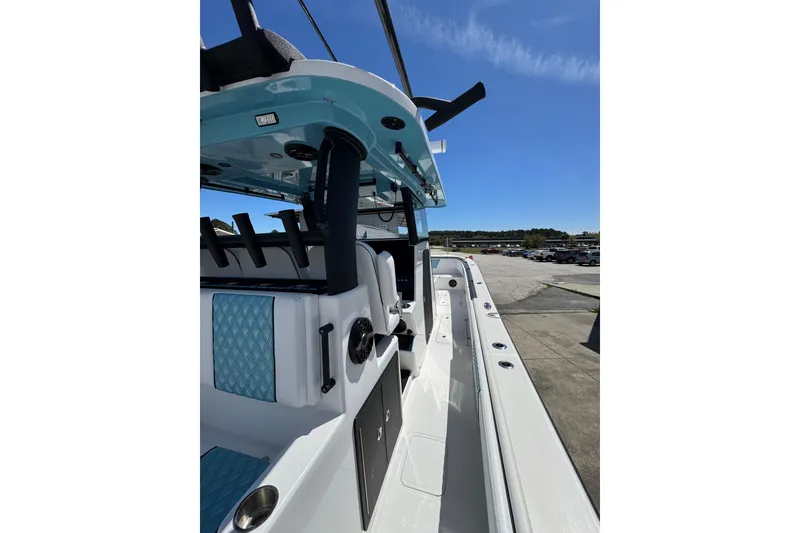 Slide: The Image of 2023 Insetta 35 IFC boat interior with blue accents and sleek design. - 10