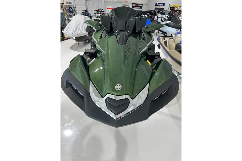 Slide: The Image of 2025 Kawasaki JV1500ASFNN jet ski in showroom, featuring sleek green design. - 4