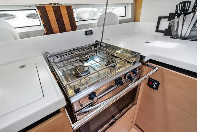 Slide: The Image of Manufacturer Provided Image: Top view layout of 2026 Jeanneau TH33 boat, featuring dual engines and interior spaces. - 12