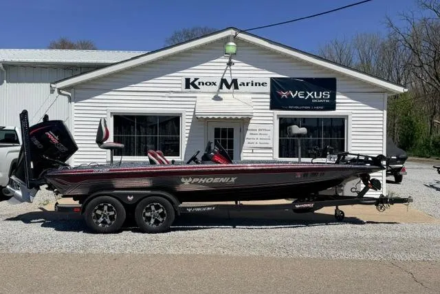 Slide: The Image of 2022 Phoenix 721 ProXP boat parked outside Knox Marine dealership. - 8