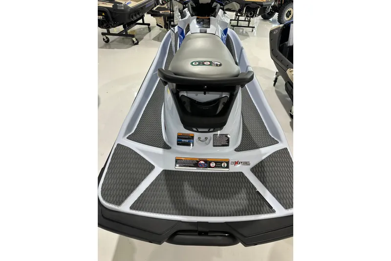 Slide: The Image of 2024 Kawasaki JN1500CRFNN jet ski, gray and black design, displayed indoors. - 6