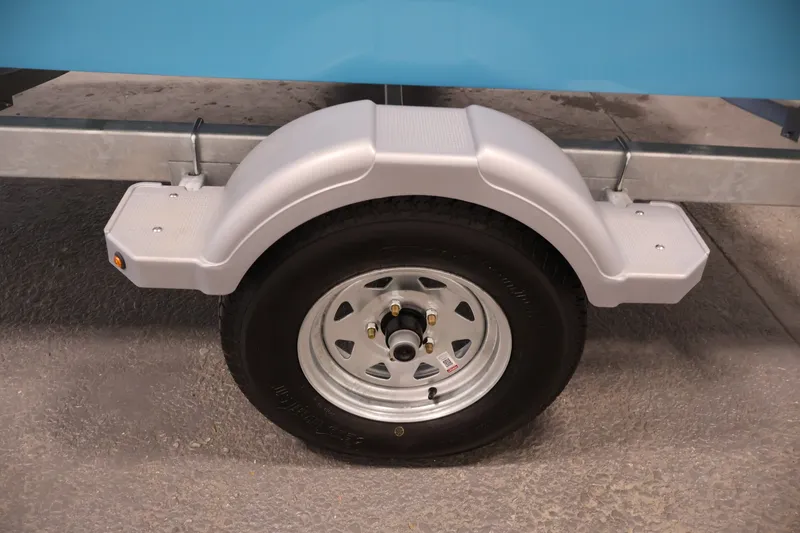Slide: The Image of Trailer wheel and fender of 2026 Bayliner Element M17 boat. - 29