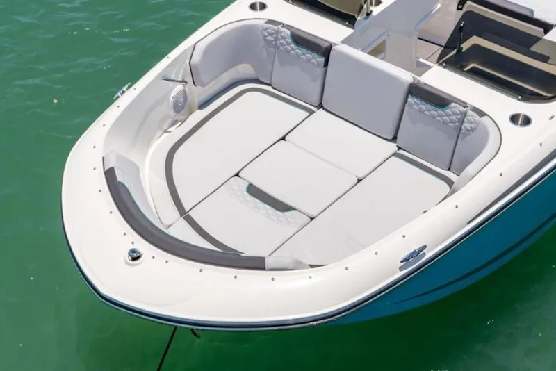 Slide: The Image of 2026 Bayliner Element M17 boat with spacious seating on calm water. - 4
